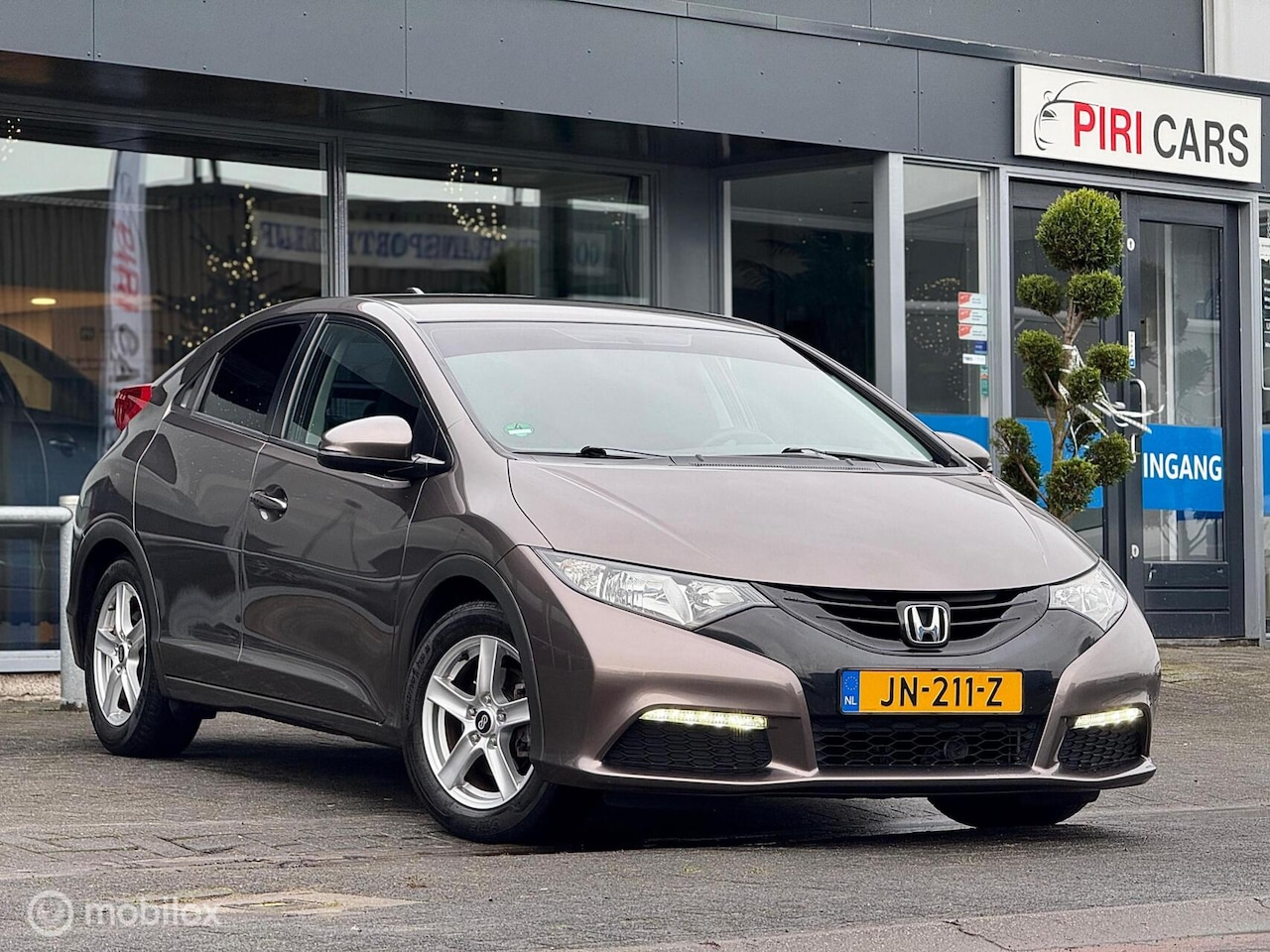 Honda Civic - 1.8 Comfort 1.8 Comfort - AutoWereld.nl