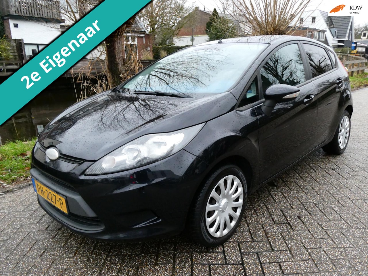 Ford Fiesta - 1.25 Limited 5-deurs 2e eig. Airco Trekhaak Zuinig Historie - AutoWereld.nl