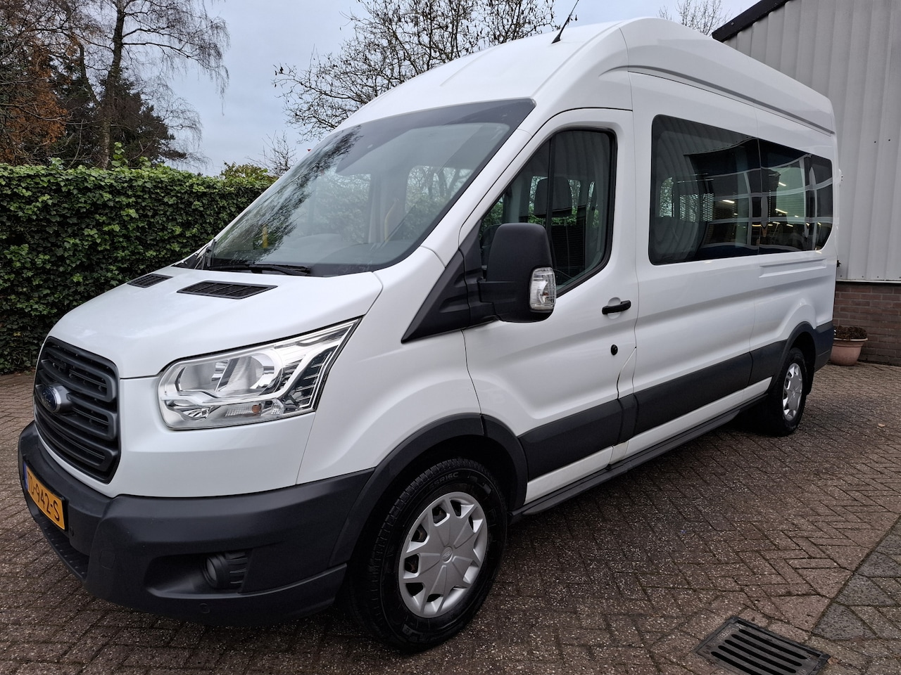Ford Transit Kombi - 350 2.0 TDCI L2H2 21750.- INCL BTW 9-PERSOONS ROLSTOEL 130PK - AutoWereld.nl