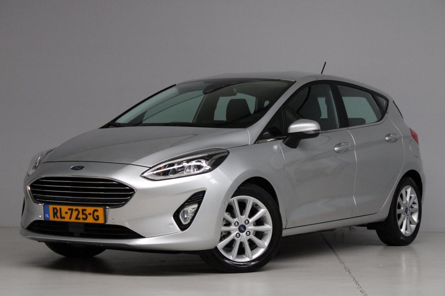 Ford Fiesta - 1.0 EcoBoost Titanium | B&O | achteruitrijcamera | keyless entry | trekhaak | led verlicht - AutoWereld.nl