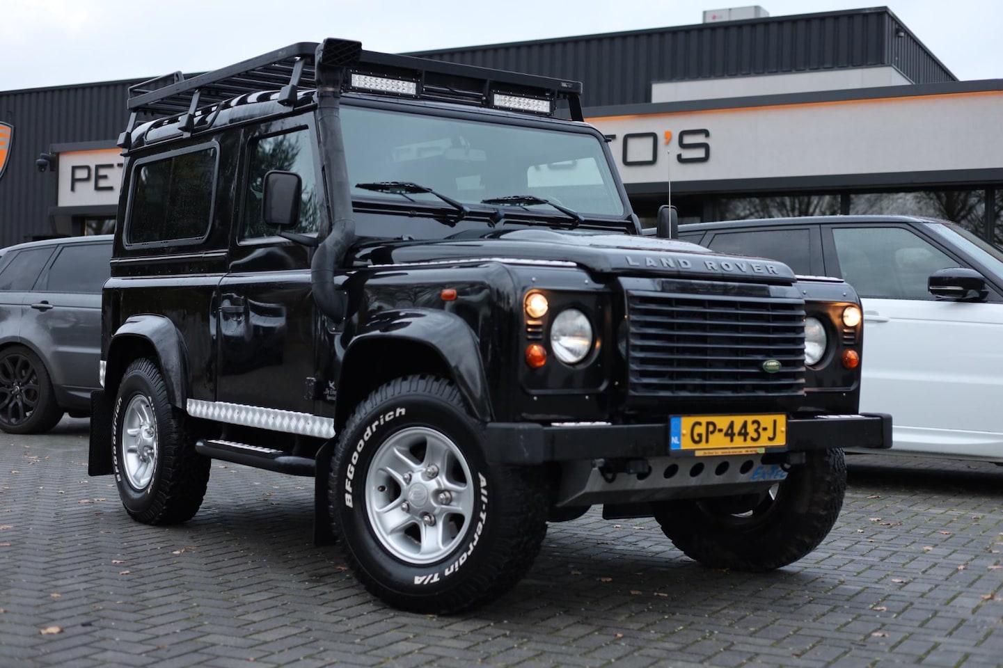 Land Rover Defender 90 - TD4 SW XTech 4Pers. | Airco | Leder | Roofrack | Youngtimer | - AutoWereld.nl