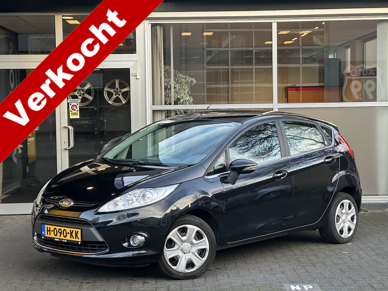 Ford Fiesta - 1.4 Ghia CLIMA / BLUETOOTH / ELEKT RAMEN / ELEKT VERSTELBARE BUITENSPIEGELS - AutoWereld.nl