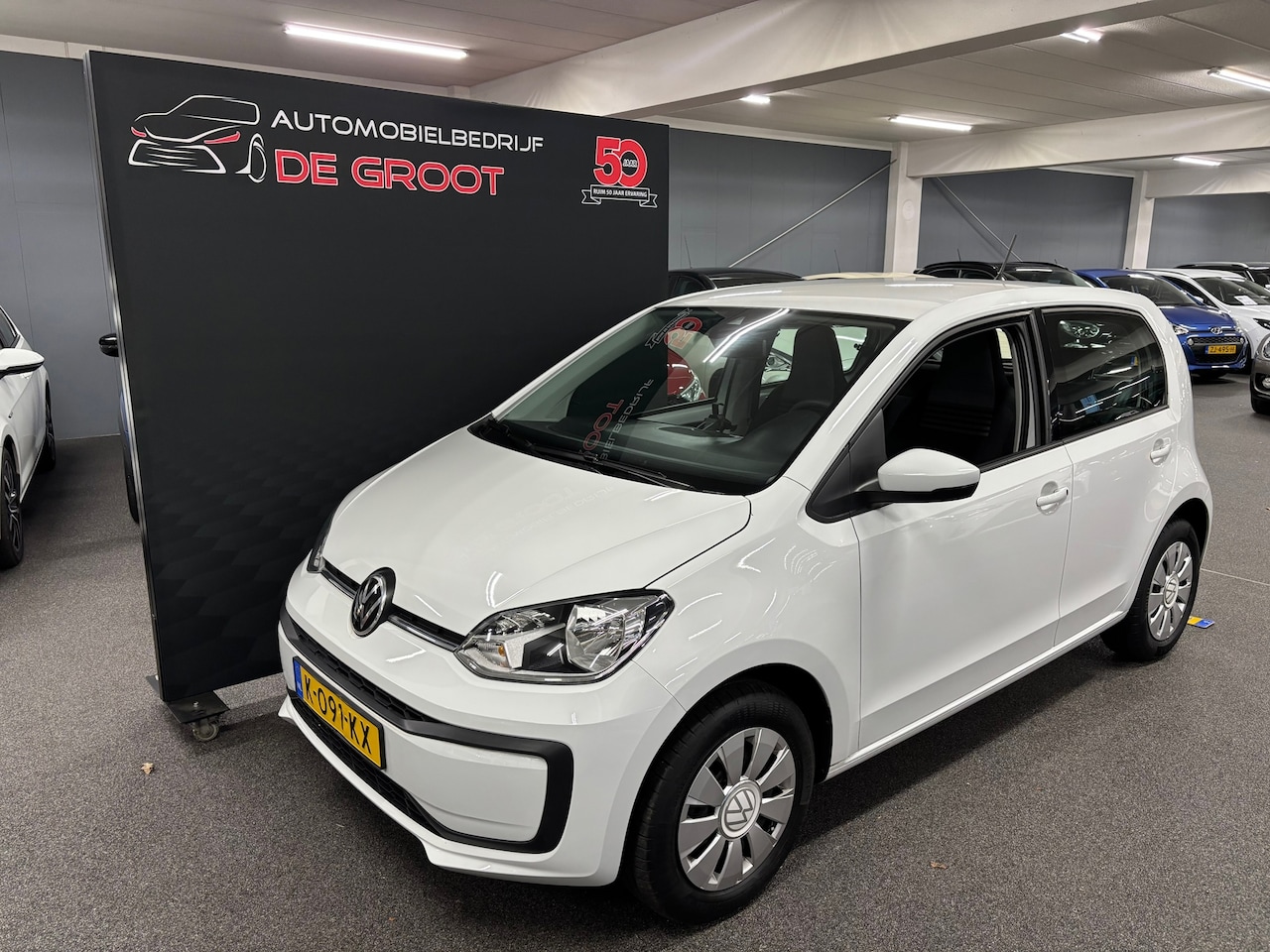 Volkswagen Up! - 1.0 BMT move up! NL-auto met airco en zeer lage km. stand - AutoWereld.nl