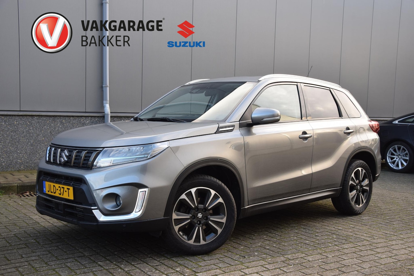 Suzuki Vitara - 1.4 Boosterjet Style Smart Hybrid | Automaat | elektrisch glazen panorama-dak | lederen/al - AutoWereld.nl
