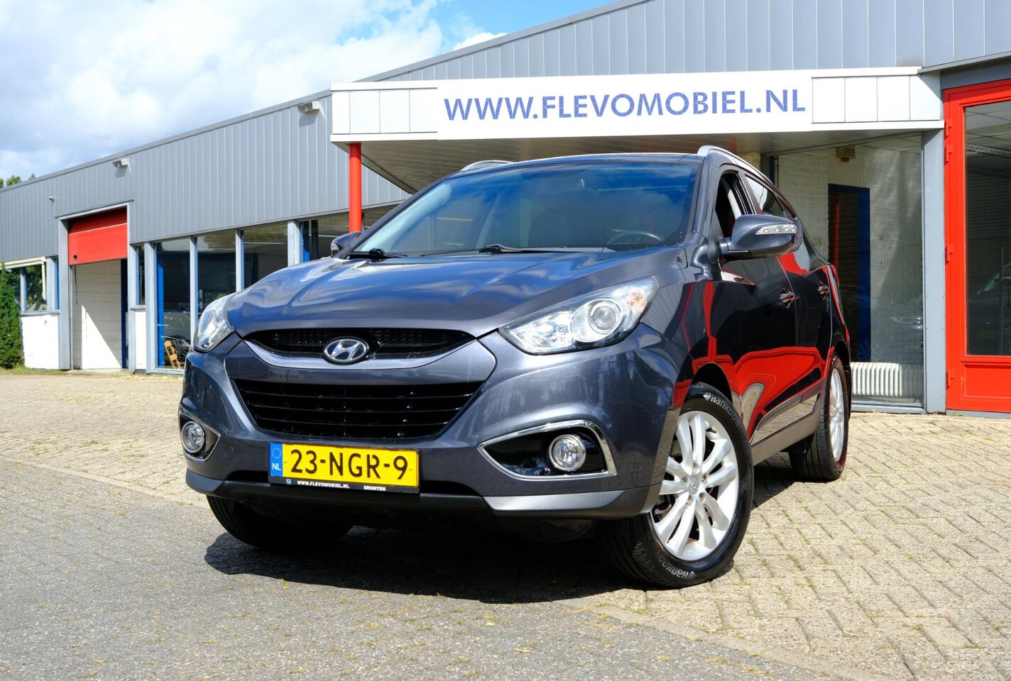 Hyundai ix35 - 2.0i i-Catcher Aut. Leder|Pano|Trekhaak|Navi - AutoWereld.nl