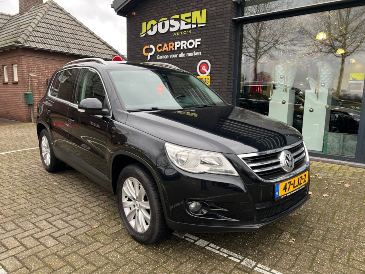 Volkswagen Tiguan - 1.4 TSI Sport&Style 1.4 TSI SPORTenSTYLE - AutoWereld.nl