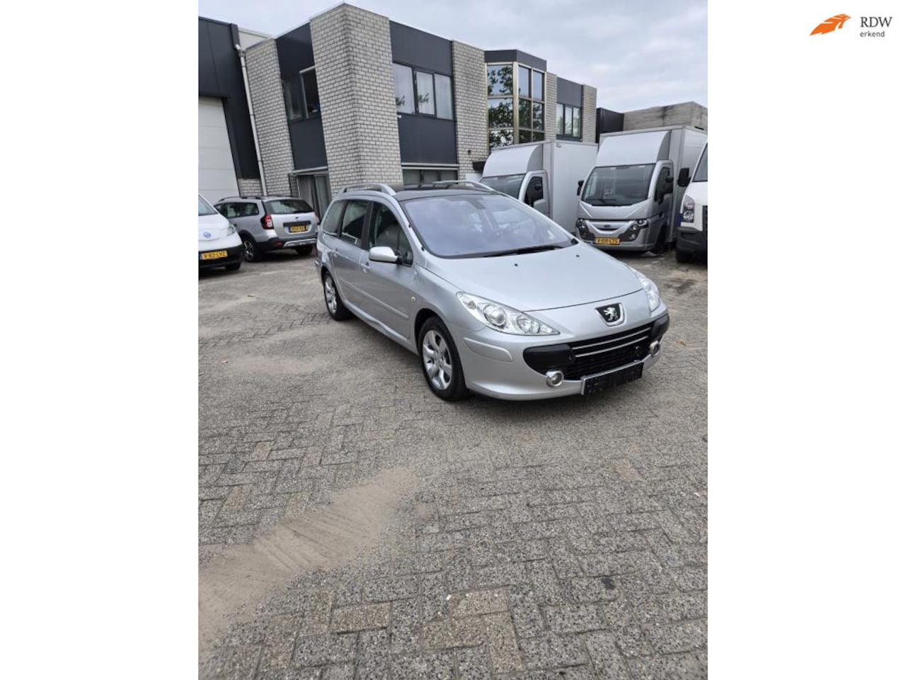 Peugeot 307 SW - 2.0 HDiF Premium NAV 2.0 HDiF Premium NAV - AutoWereld.nl