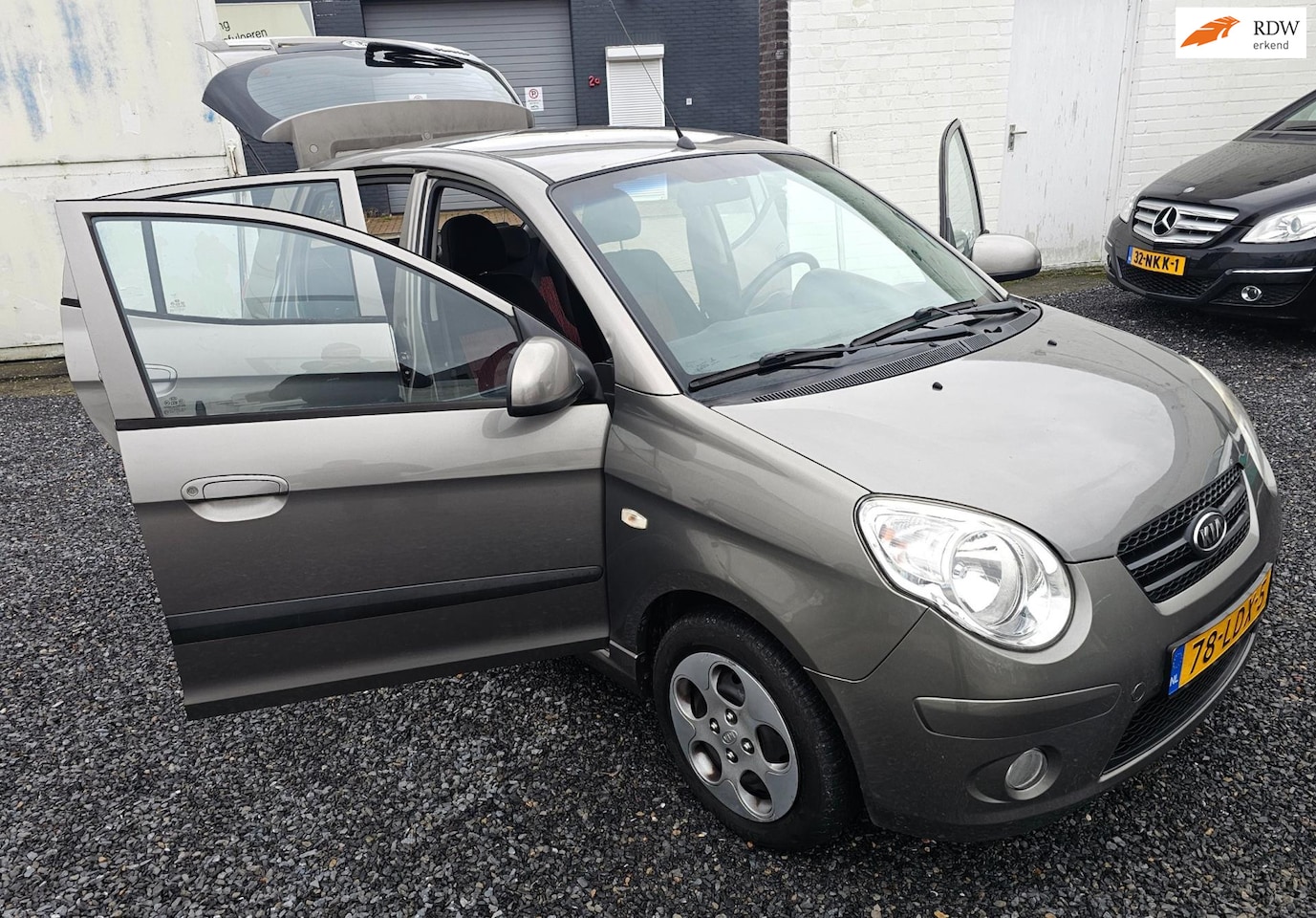 Kia Picanto - 1.0 Seven 5 Deurs zeer netjes airco - AutoWereld.nl