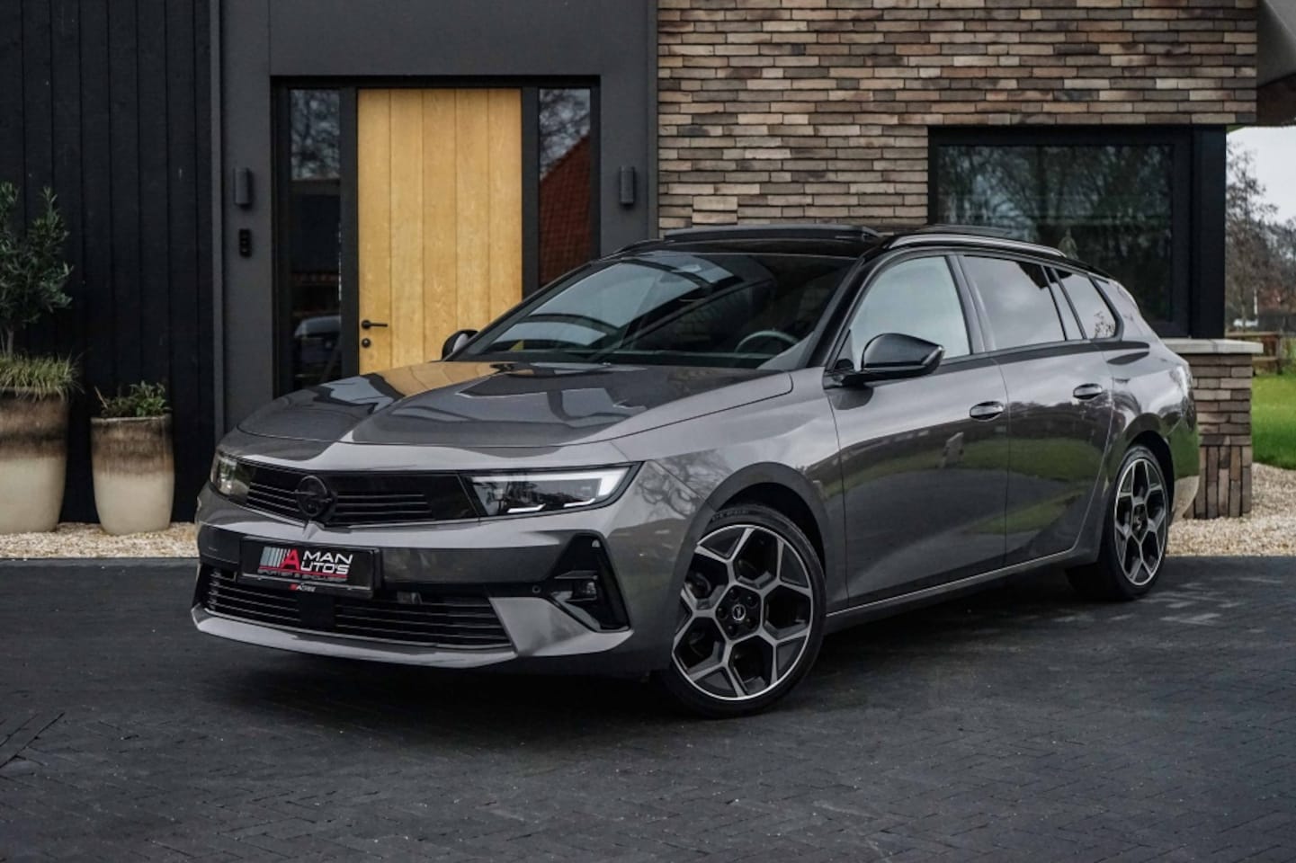 Opel Astra Sports Tourer - Ultimate-edition Pano/HUD/Memory/360/VOL! - AutoWereld.nl