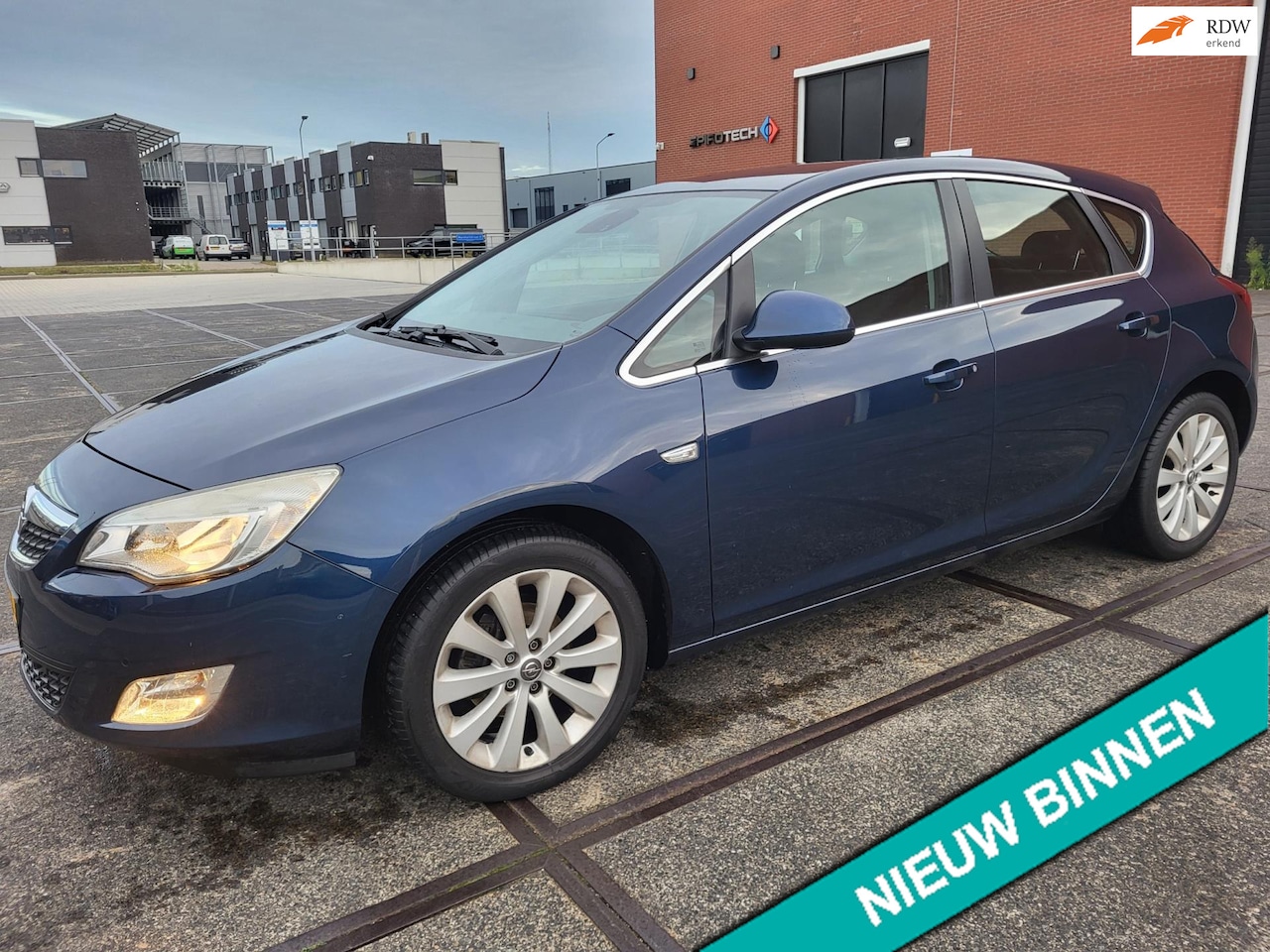 Opel Astra - 1.4 Turbo Cosmo 1.4 Turbo Cosmo,navi,cr.control - AutoWereld.nl