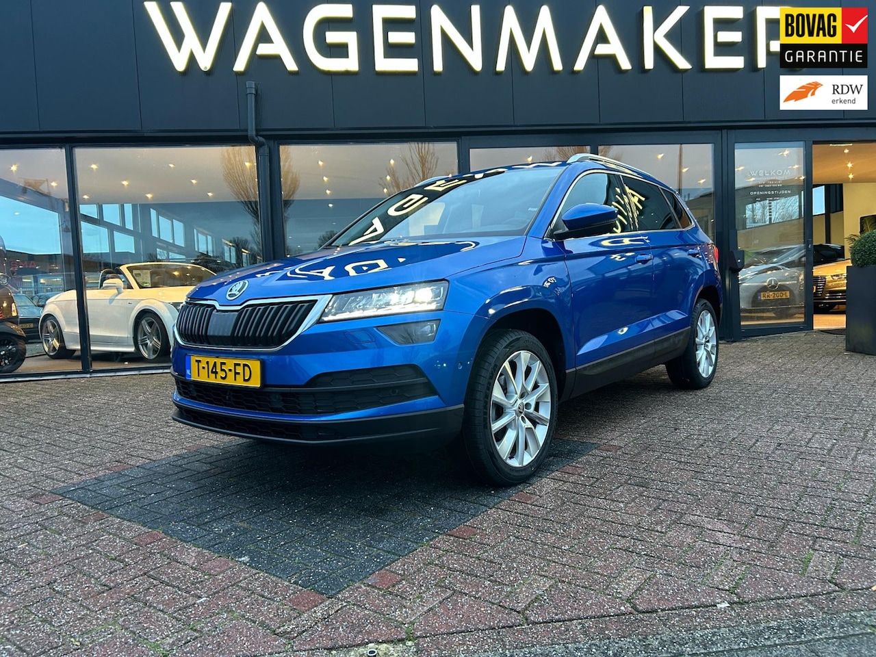 Skoda Karoq - 1.5 TSI ACT Sportline Business AUT|Clima|ACC|Navi - AutoWereld.nl