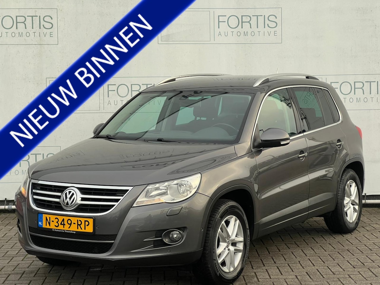 Volkswagen Tiguan - 1.4 TSI Sport&Style STOELVERWARMING | NAVI | PDC - AutoWereld.nl