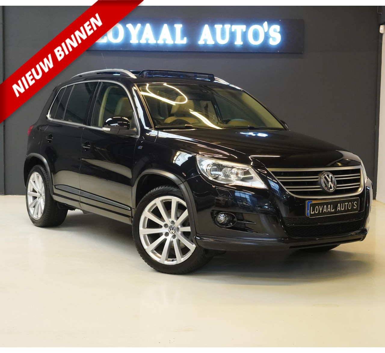 Volkswagen Tiguan - 1.4 TSI Sport&Style | SCHUIFDAK | LEER | XENON | PDC | APK. - AutoWereld.nl