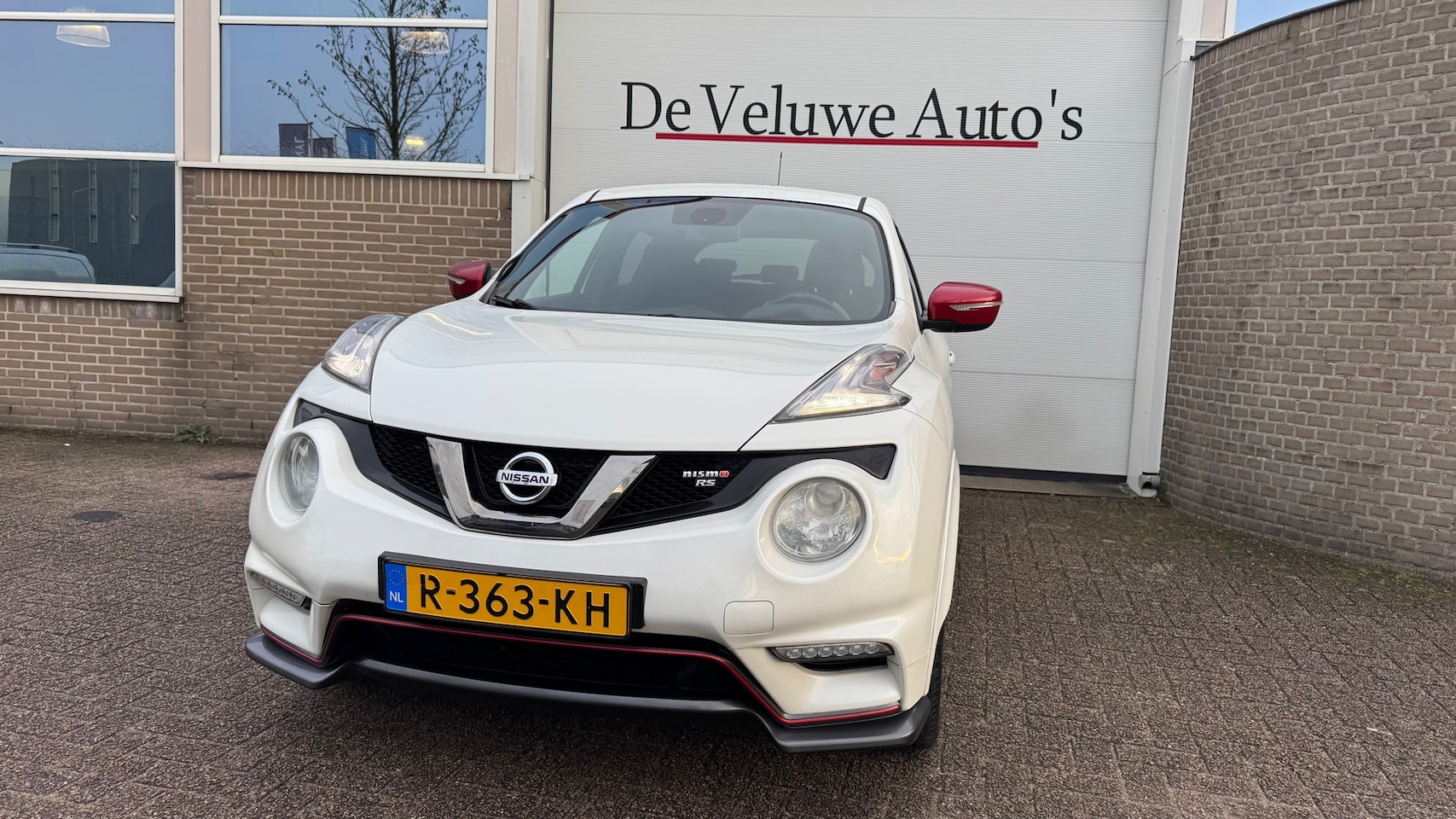 Nissan Juke - 1.6 DIG-T Nismo RS |Keyless|Trekhaak|Camera|Navi - AutoWereld.nl