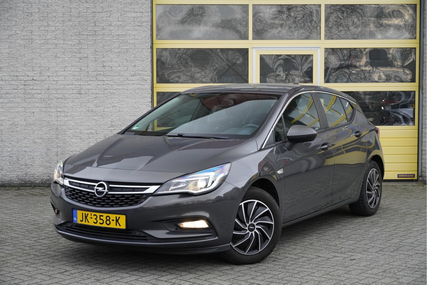Opel Astra - 1.4 150PK! 5drs Edition BJ2016 Led | Pdc | Navi | Trekhaak | Climate control | Cruise cont - AutoWereld.nl