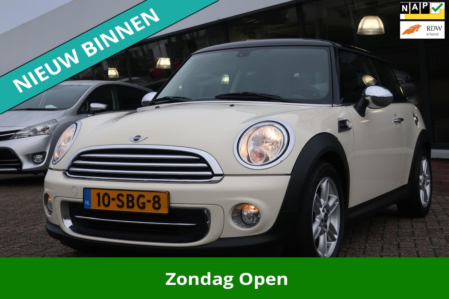 MINI Cooper - Mini 1.6 10 Years II 1e EIG_LEDER_NAVI_CRUIS_PDC_NAP. - AutoWereld.nl