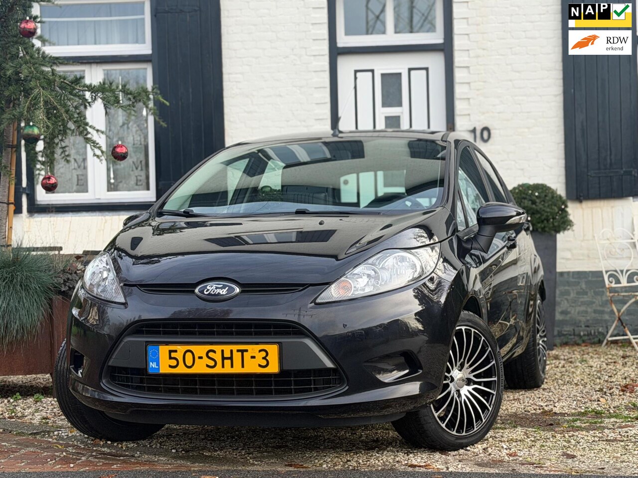 Ford Fiesta - 1.25 Limited|Airco|Bluetooth|Navi|Nette auto! - AutoWereld.nl