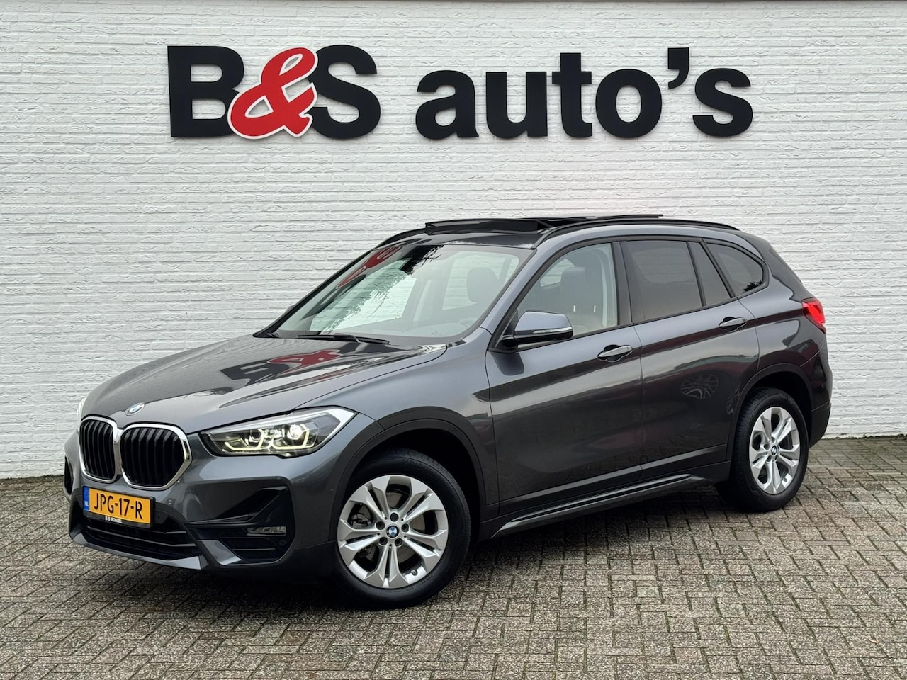 BMW X1 - SDrive18i High Executive Automaat Cruise Climate control Leer+memory Sfeerverlichting Navi - AutoWereld.nl