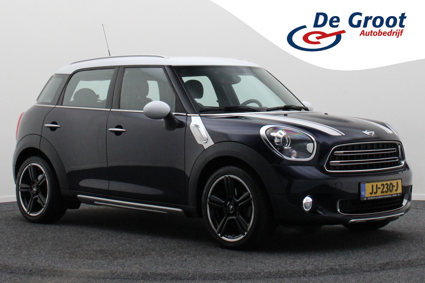 MINI Countryman - Mini 1.6 Cooper Pepper Automaat JCW Package, Xenon, Navigatie, Climate, PDC, 18" - AutoWereld.nl