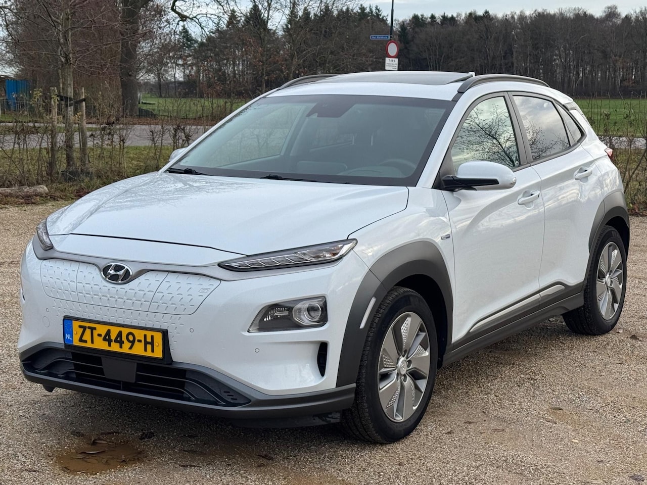 Hyundai Kona Electric - EV Premium 64 kWh SOH99% *LEDER/CAMERA/SCHUIFDAK/NAVI - AutoWereld.nl
