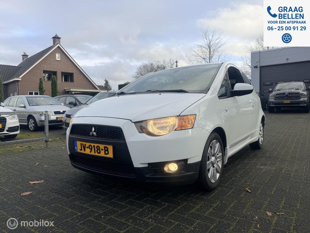 Mitsubishi Colt - 1.1 Edition One Sport / LM / Airco / Audio - AutoWereld.nl
