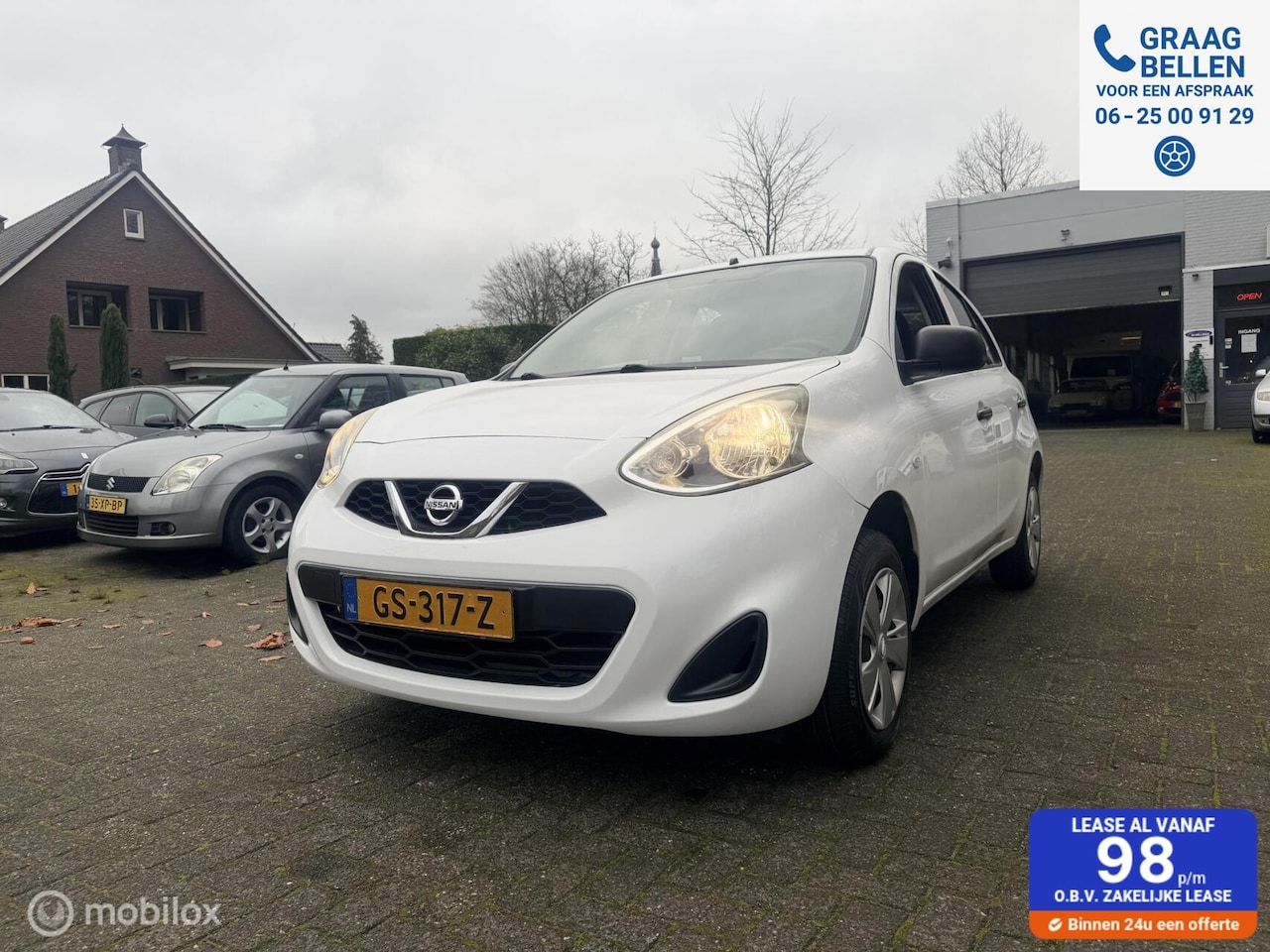Nissan Micra - 1.2 5 deurs Visia Pack Airco / BlueTooth / Elec ramen / NAP - AutoWereld.nl