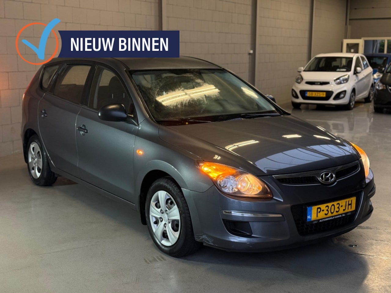 Hyundai i30 CW - 1.4i Blue Active Airco - AutoWereld.nl
