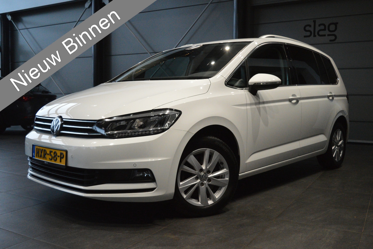 Volkswagen Touran - 1.5 TSI Highline navi clima cruise led pdc trekhaak 150 pk !! - AutoWereld.nl