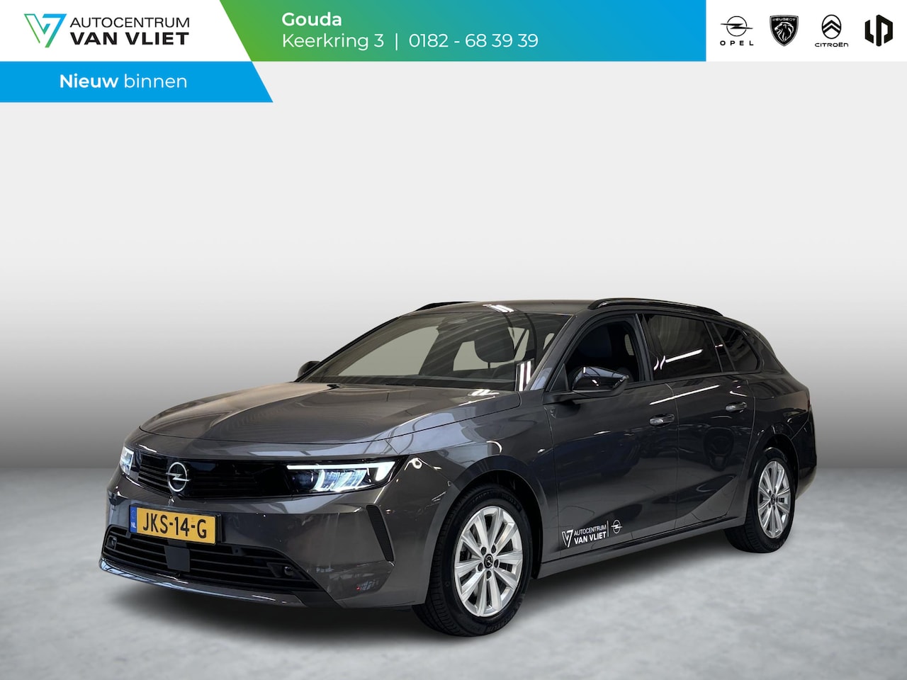 Opel Astra Sports Tourer - 1.2 Turbo Business Edition Automaat | AGR | Stoelverwarming | Stuurverwarming | Navigatie - AutoWereld.nl