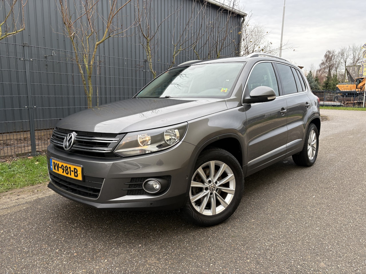 Volkswagen Tiguan - 1.4 TSI Sport&Style 4motion / NAVI / AIRCO / 159dkm! NAP! - AutoWereld.nl