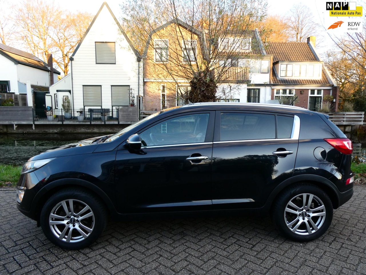 Kia Sportage - 2.0 X-ecutive Plus Pack 163pk Clima Cruise Trekhaak 1900kg. - AutoWereld.nl