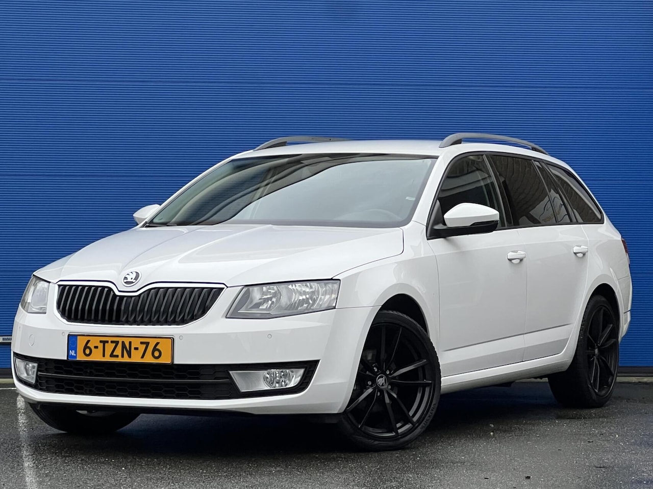 Skoda Octavia Combi - 1.6 TDI | PDC | Cruise | Airco - AutoWereld.nl