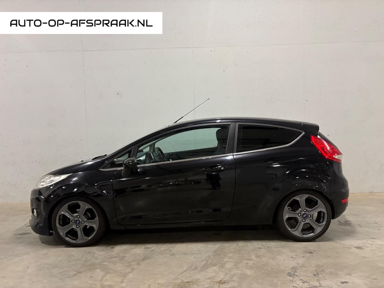 Ford Fiesta - 1.25 Titanium 3drs. ST Navi Clima Cruise PDC APK NAP - AutoWereld.nl