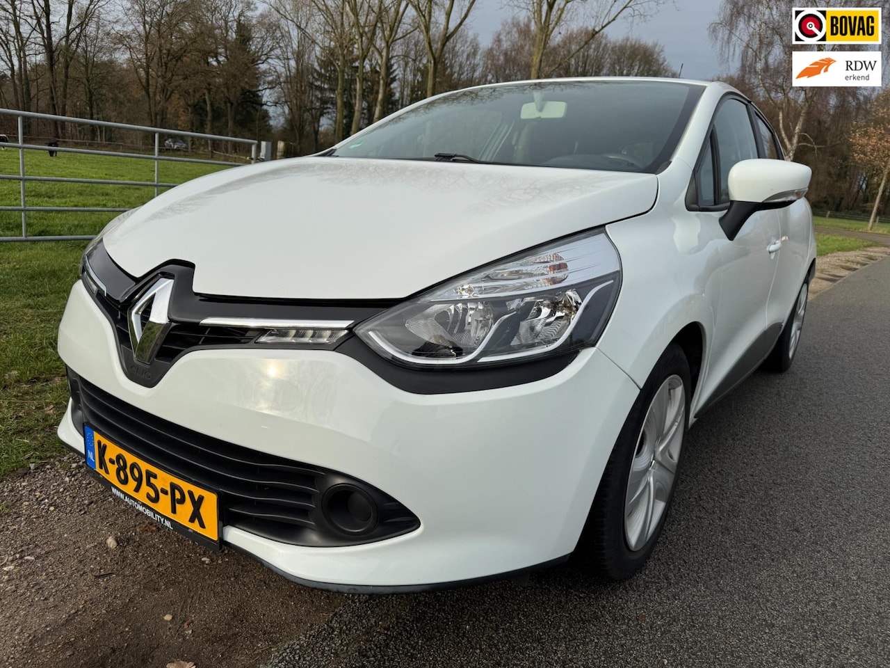 Renault Clio - 1.2 16V met navigatie en stoelverwarming - AutoWereld.nl