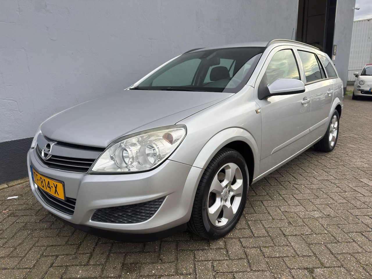 Opel Astra Wagon - 1.4 Essentia - Airco - Trekhaak - LMV - AutoWereld.nl