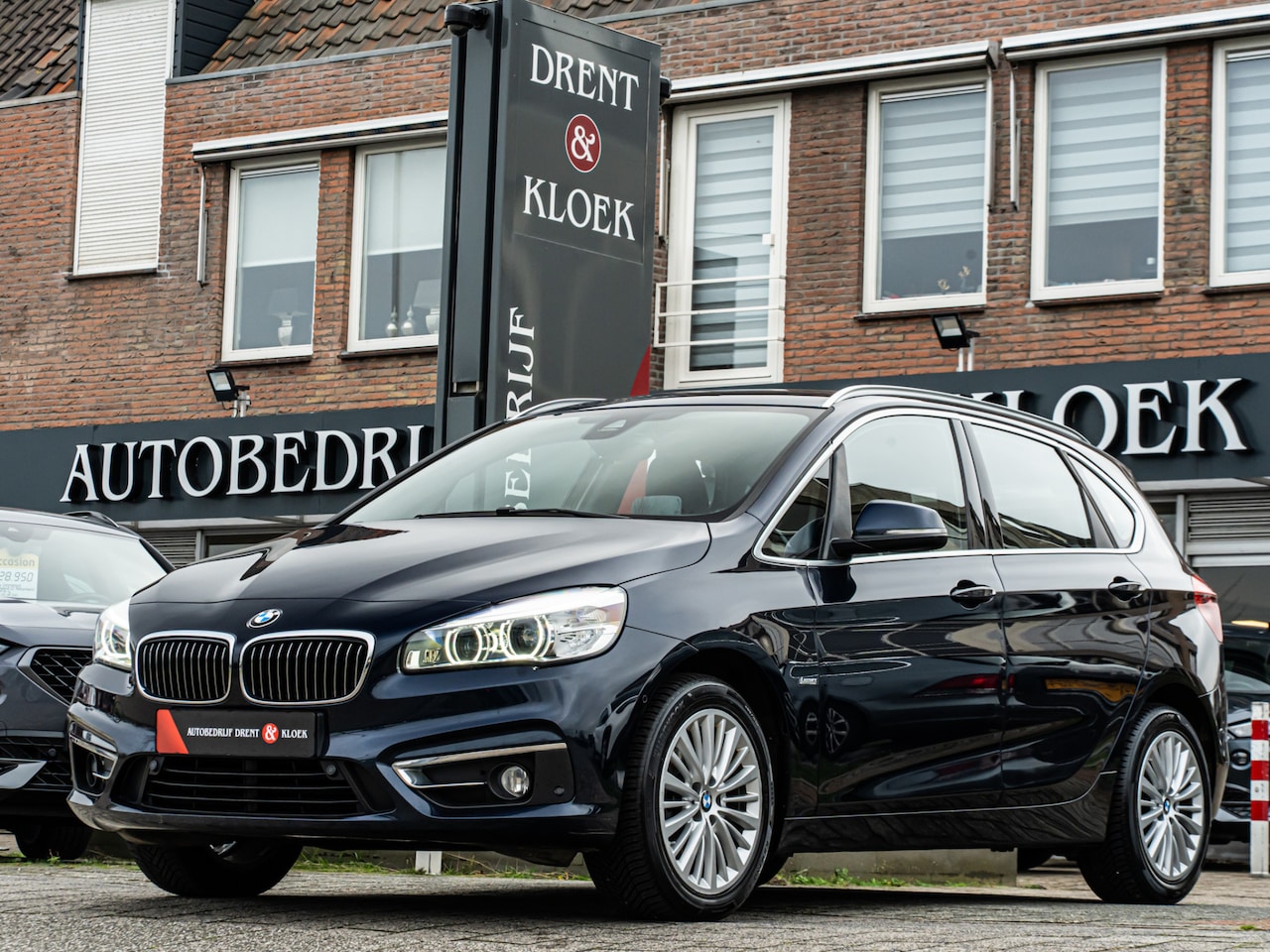 BMW 2-serie Active Tourer - 218i Corporate Lease High Exe ORG NL HUD CAMERA HIFI LEDER STOELVERW - AutoWereld.nl