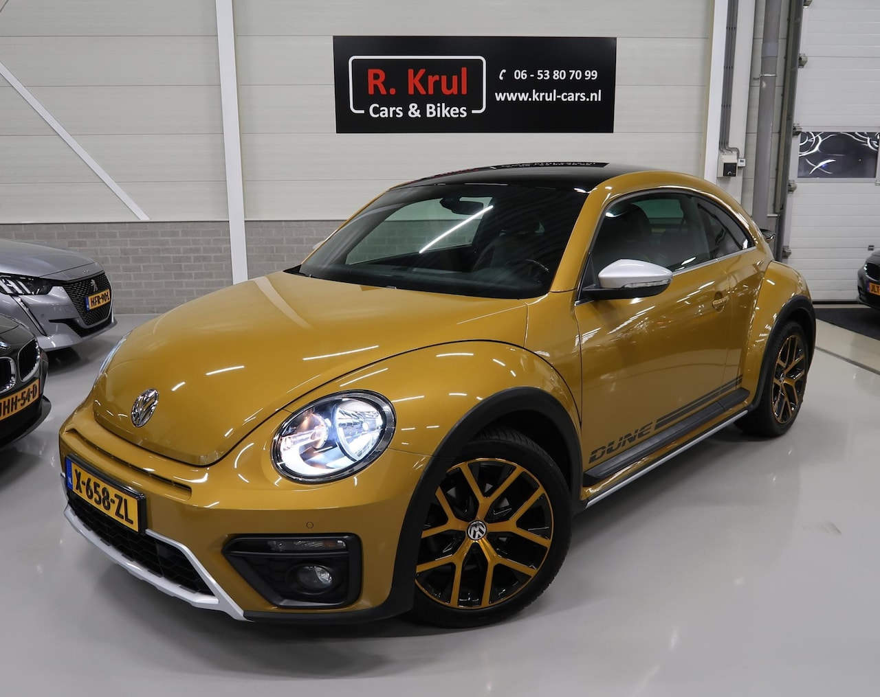 Volkswagen Beetle - 1.2 TSI Dune Airco-ecc LED BT Navigatie 18 inch Stoelverwarming Cruise Mistlampen Extra ge - AutoWereld.nl