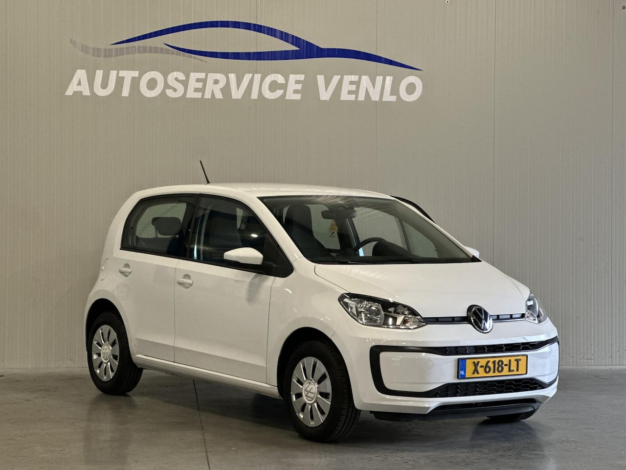 Volkswagen Up! - 1.0 5-deurs Wit | 12-2023 | Navi App | NIEUWSTAAT - AutoWereld.nl