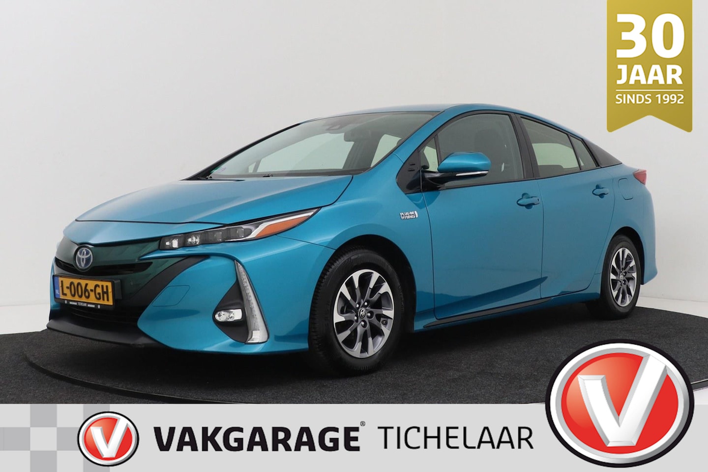 Toyota Prius - 1.8 Plug-in Business Plus | Head-Up | Adap. Cruise | Camera | Navigatie | Stoelverwarming - AutoWereld.nl