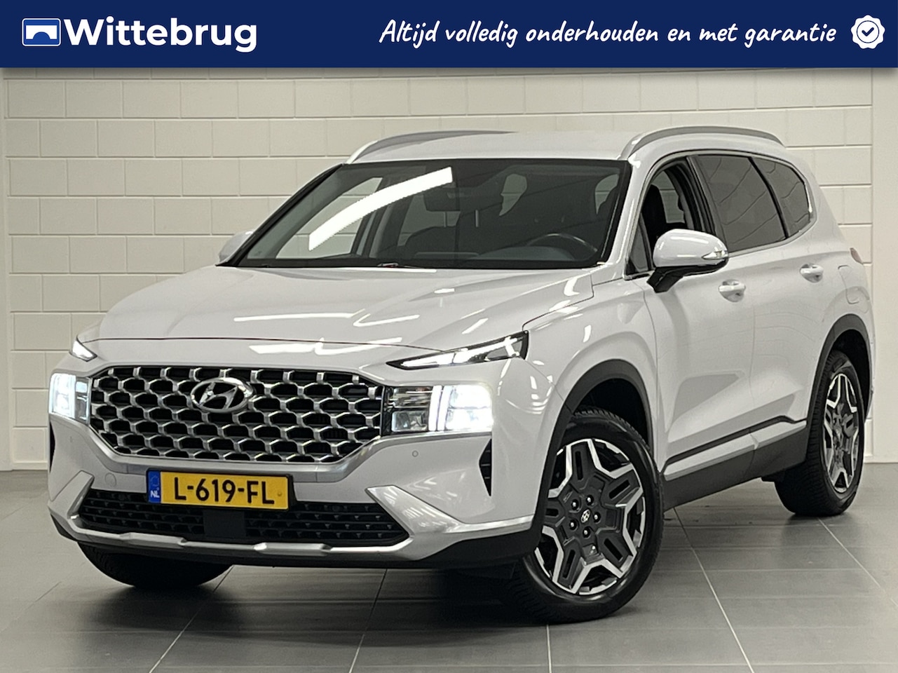 Hyundai Santa Fe - 1.6 T-GDI HEV Comfort Smart TREKHAAK | NAVIGATIE | ALL SEASON BANDEN - AutoWereld.nl