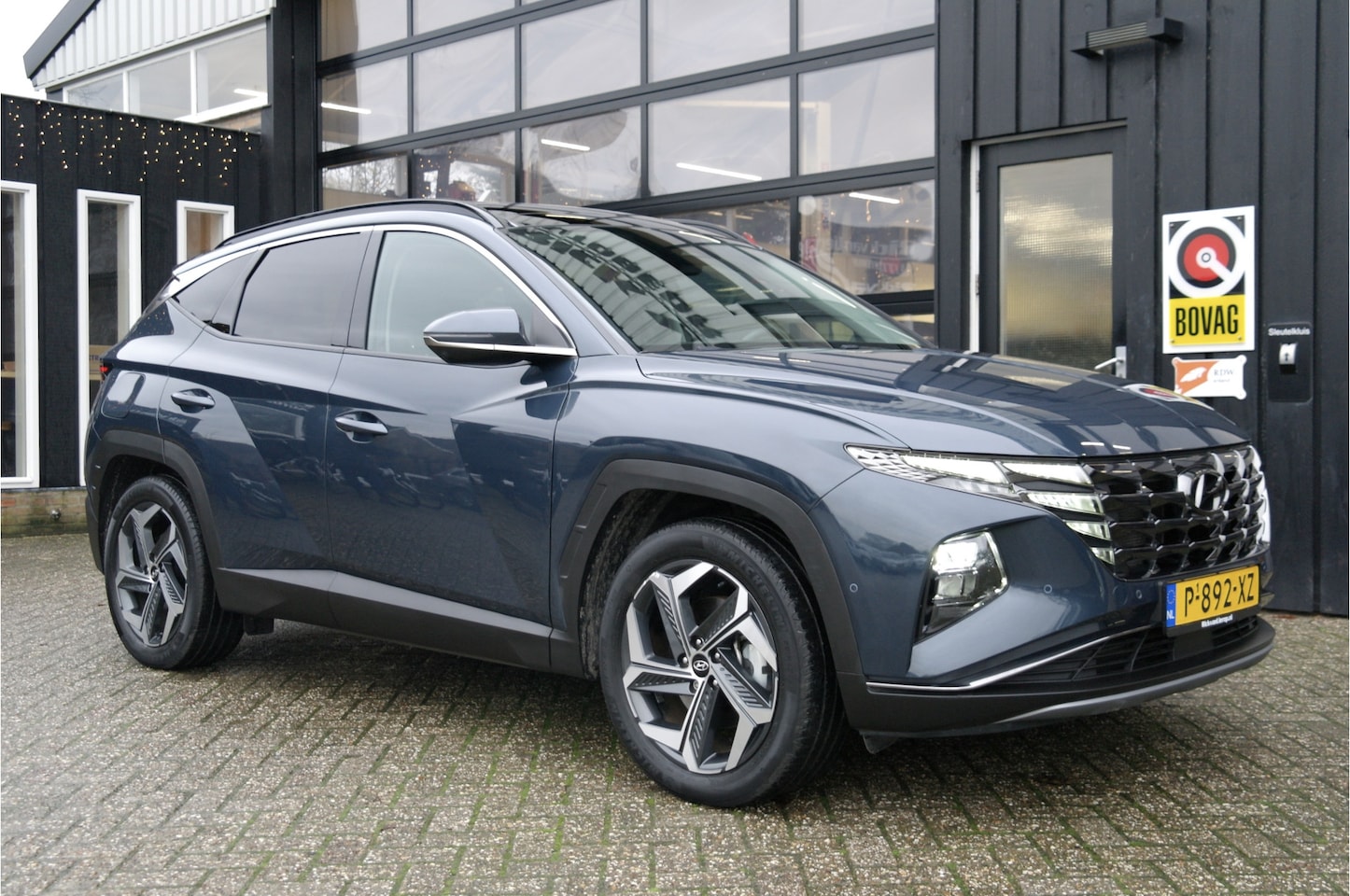 Hyundai Tucson - 1.6 T-GDI PHEV Premium Sky 4WD | NL-Auto | Pano | Leder | Stuur + Stoelverwarming - AutoWereld.nl