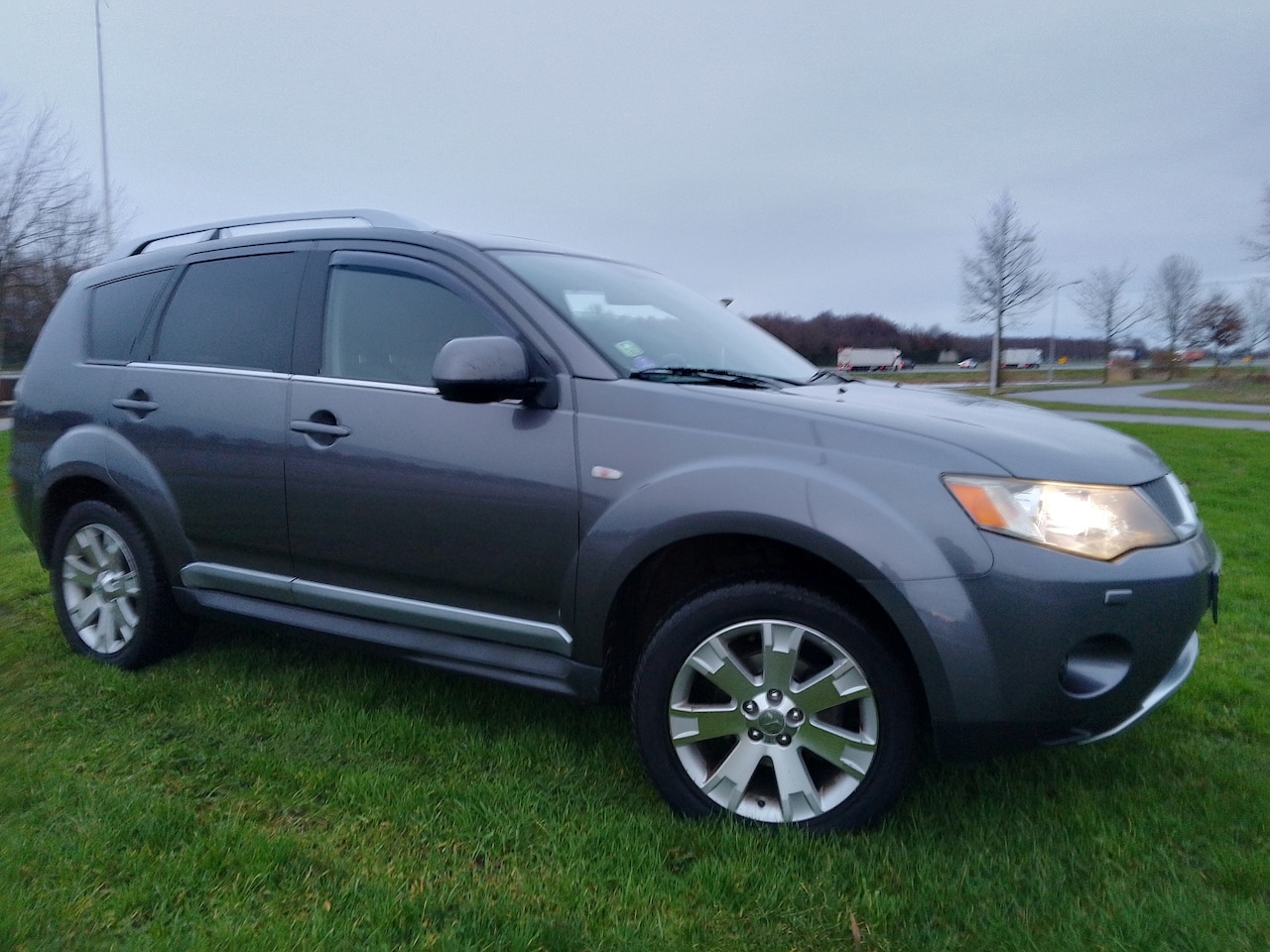 Mitsubishi Outlander - 2.4 Instyle UNIEK MOOIE STAAT Grijs kenteken, Leer, Stoelverwarming enz. - AutoWereld.nl