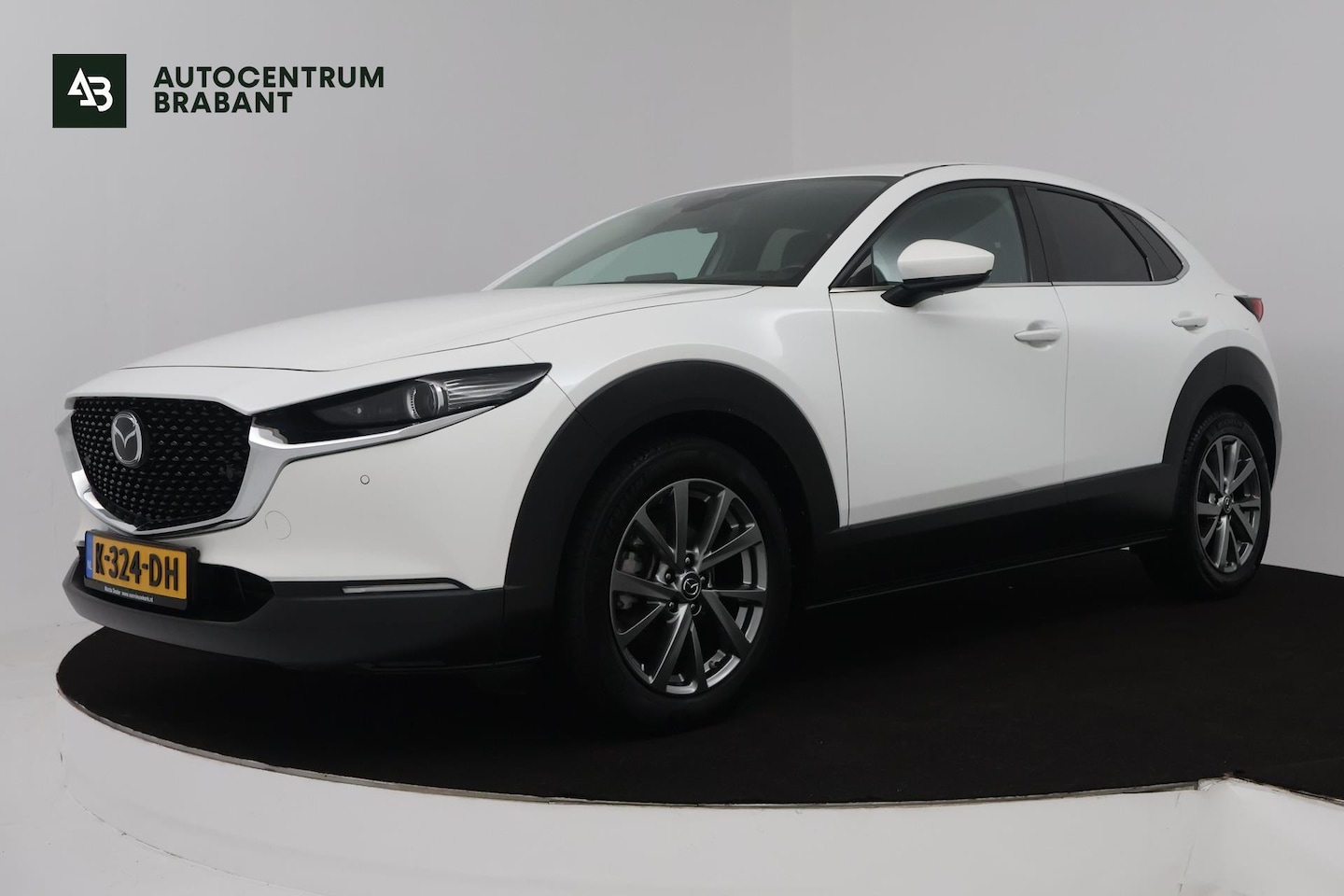 Mazda CX-30 - 2.0 e-SkyActiv-X M Hybrid Luxury (STOEL/STUUR VERWARMING, TREKHAAK, ELEKTR STOELEN, ACHTER - AutoWereld.nl