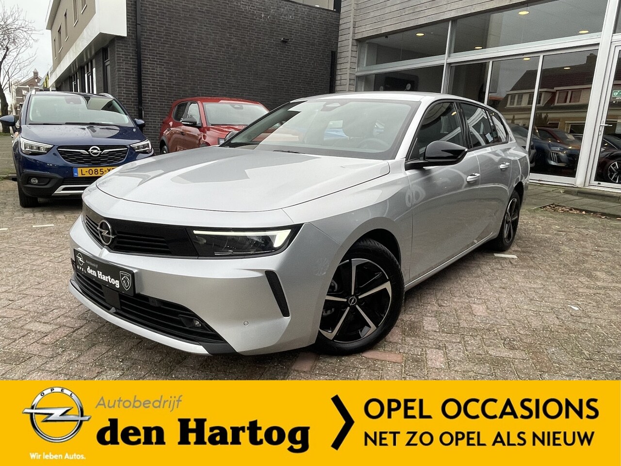 Opel Astra Sports Tourer - 1.2 Business Edition ECC/Parkeerhulp V+A/Apple Carplay/Android Auto. - AutoWereld.nl