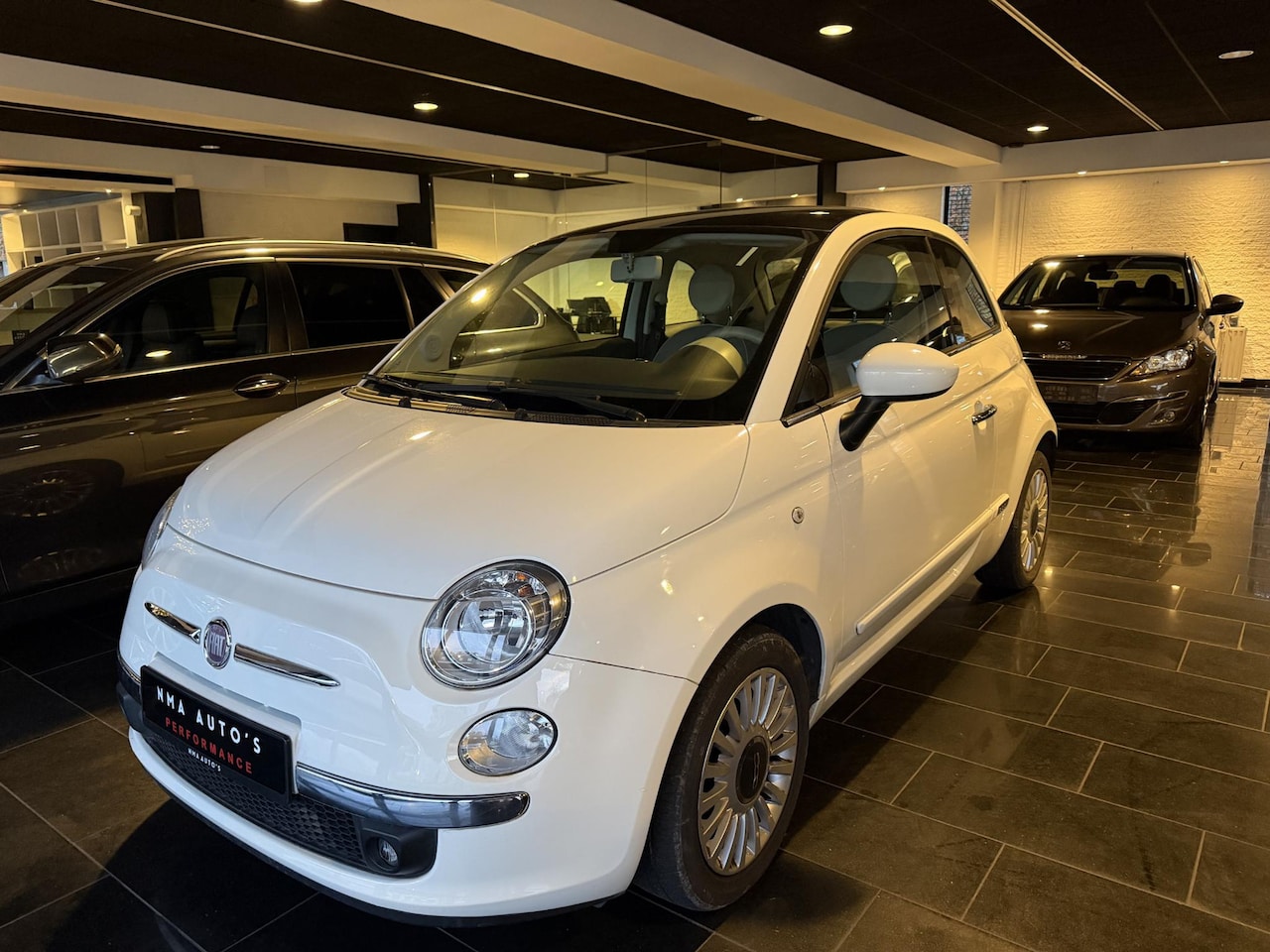 Fiat 500 - 0.9 TwinAir Lounge 52.000KM / PANO / AIRCO / PDC / START STOP / ONDERHOUDEN - AutoWereld.nl