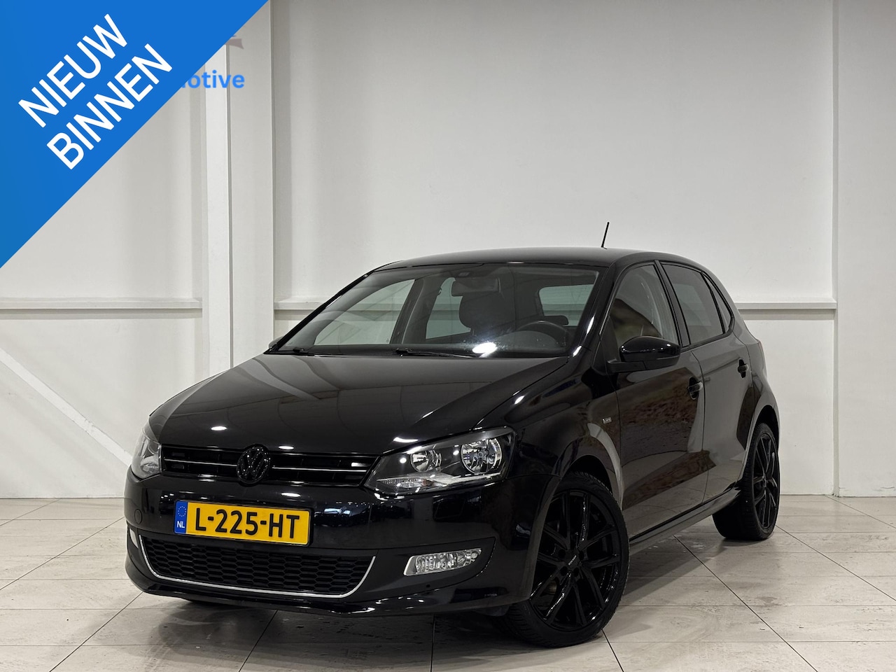 Volkswagen Polo - 1.2-12V BlueMotion Comfortline | Life | Climate Control | Parkeersensoren | Lichtmetalen 1 - AutoWereld.nl
