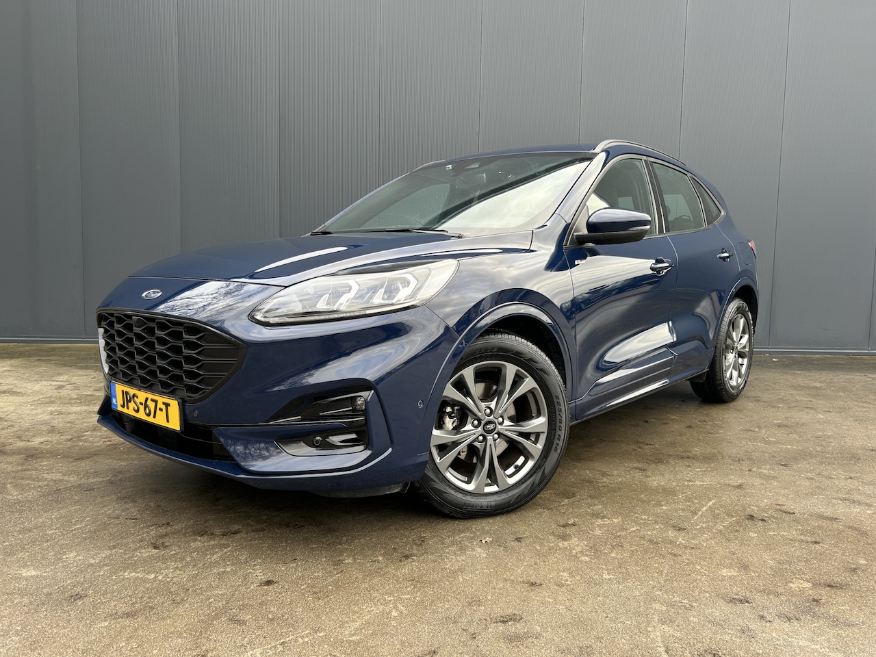 Ford Kuga - 2.5 FHEV HYBRIDE ST LINE 1e EIGENAAR HEAD UP CAMERA ADAP CRUISE 1.600 AHG NAVI ECC - AutoWereld.nl