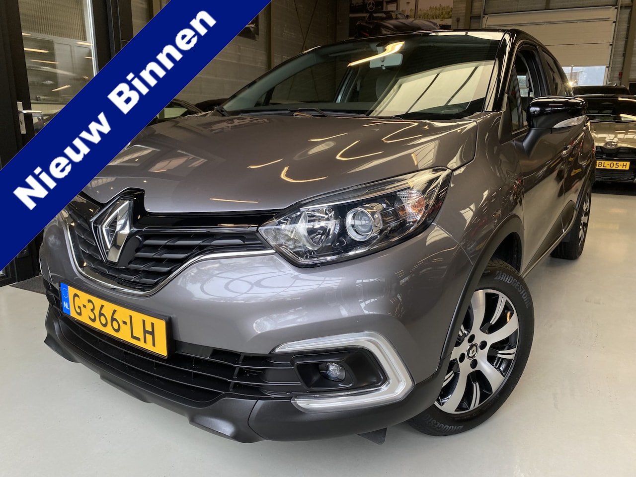 Renault Captur - 0.9 TCe Limited Navi, Cruise, Keyless - AutoWereld.nl