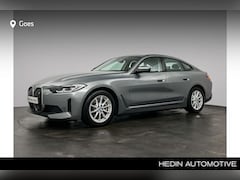 BMW i4 - eDrive40 High Executive 84 kWh | Comfort Access | Achteruitrijcamera | Elektrisch verwarmd