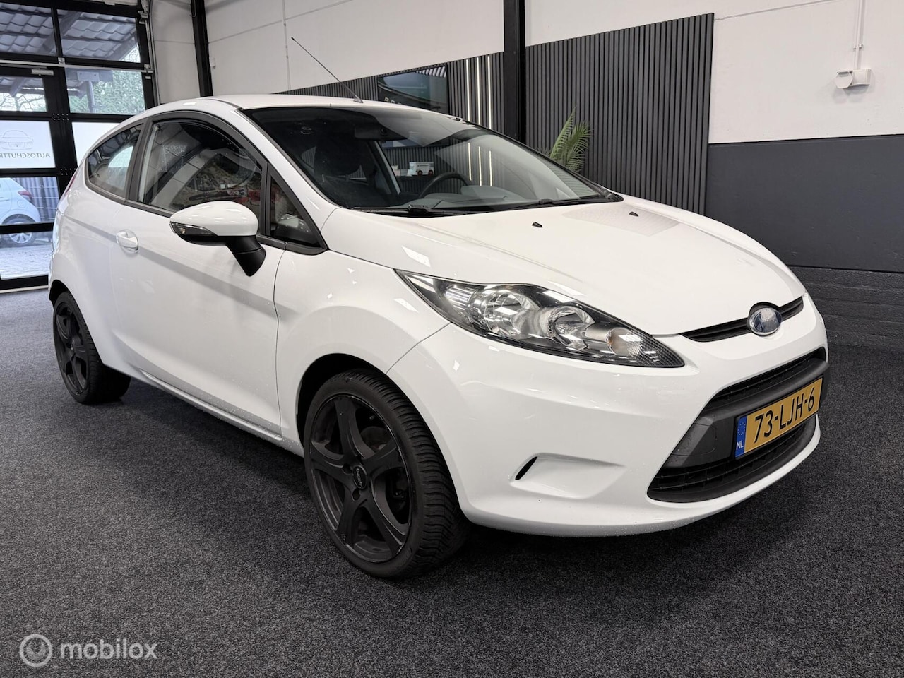 Ford Fiesta - 1.25 Limited AIRCO / LMV / ALL SEASON / APK: 15-08-2026 - AutoWereld.nl